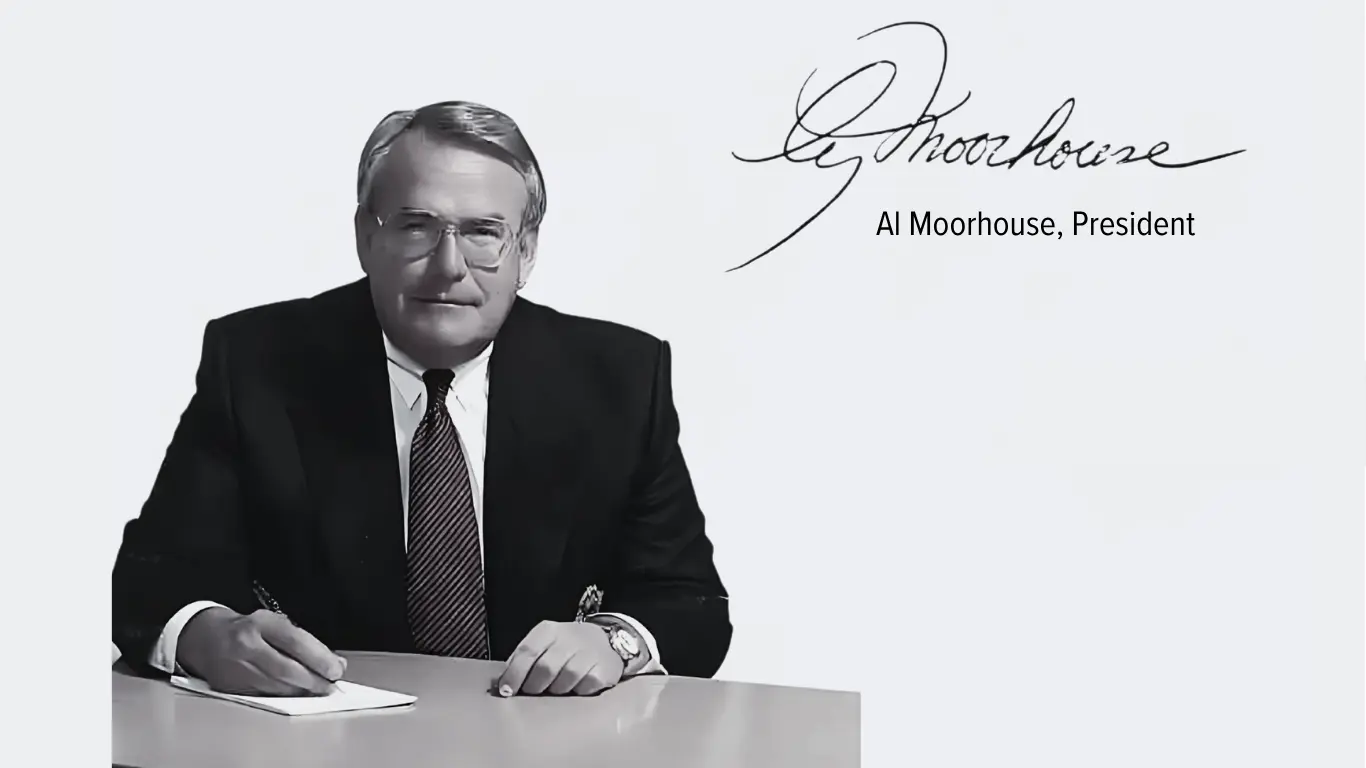 Signed image of Al Moorhouse sitting at desk